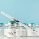 covid-19-vaccine-and-syringe